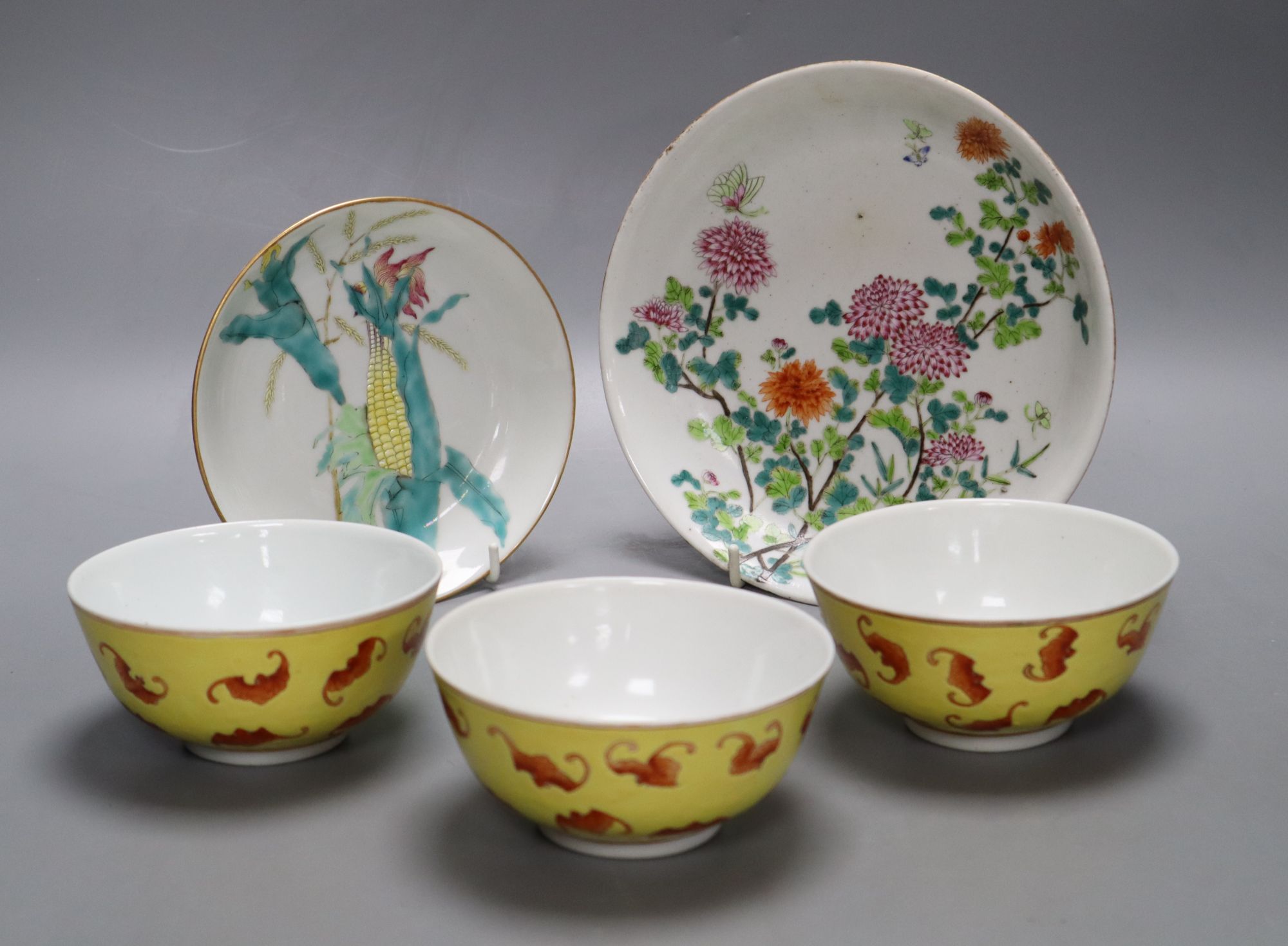 Two Chinese famille rose saucer, dishes and three yellow ground bat bowls, largest diameter 18.5cm